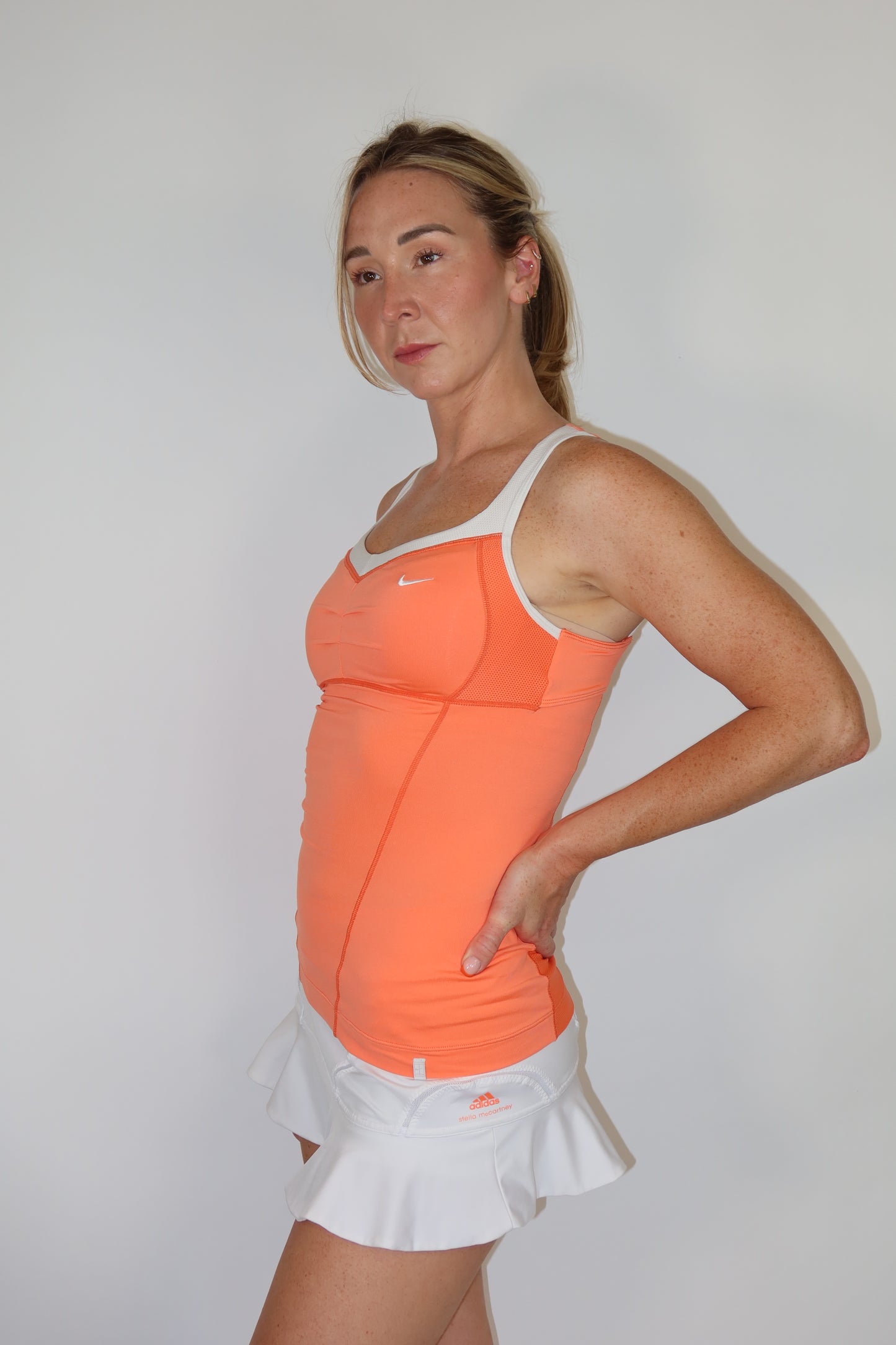 nike orange & white top