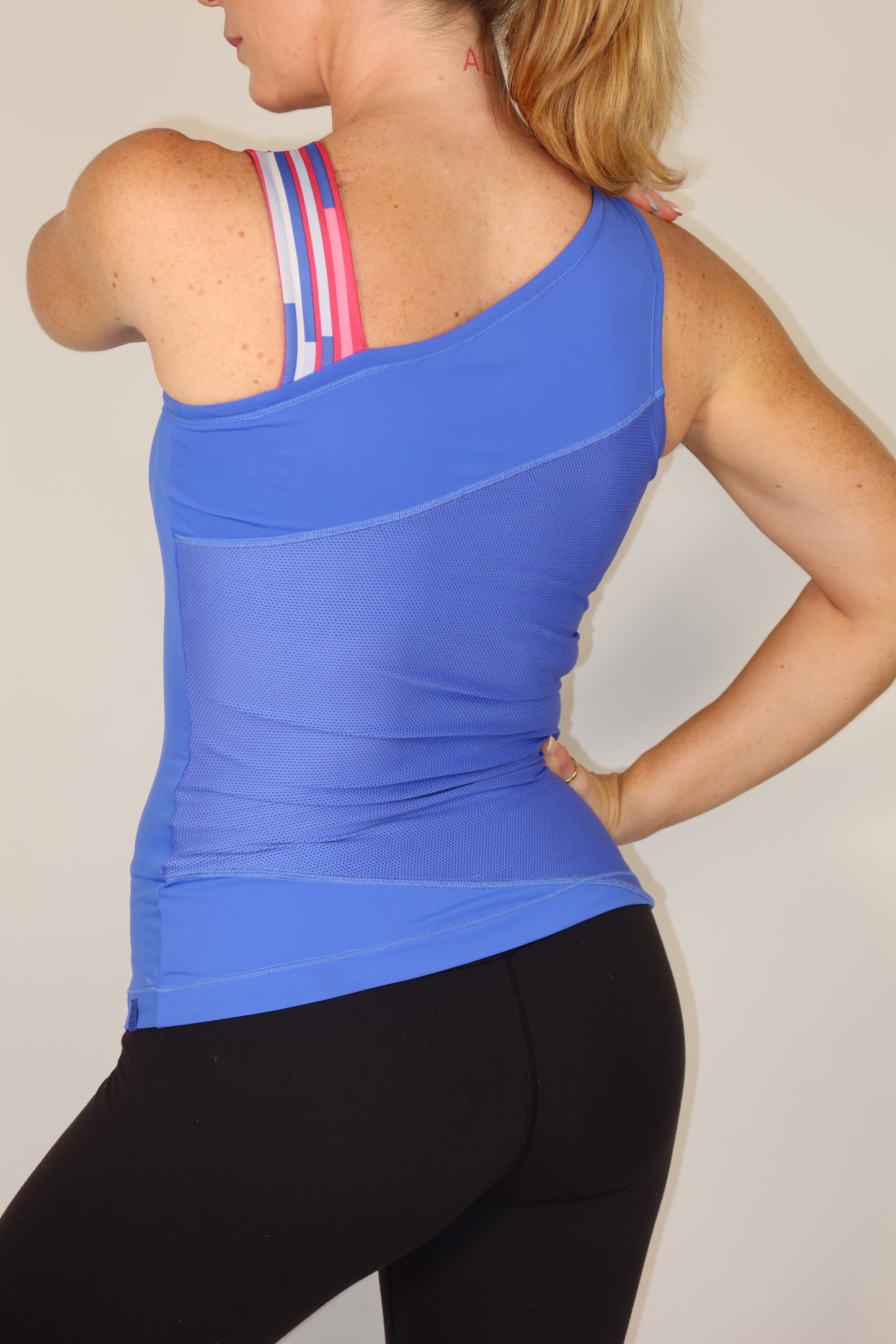 nike asymmetric top